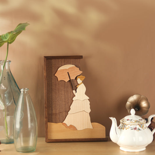 Wooden Collage of a Woman Holding an Umbrella