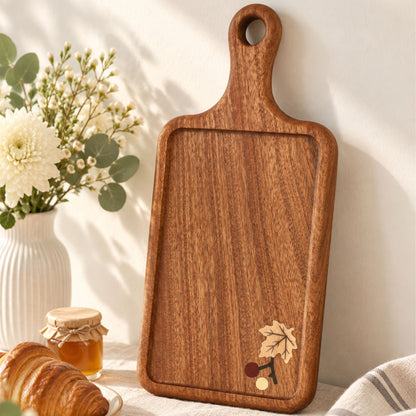 Rectangular wooden serving board with botanical inlay